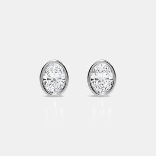 Everywhere_Bezel_Set_Lab_Grown_Diamond_Studs_in_14k_Yellow_and_White_Gold_Oval_Cut